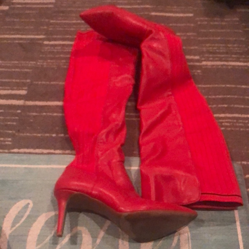 Red size 8.5 knee high strength boots